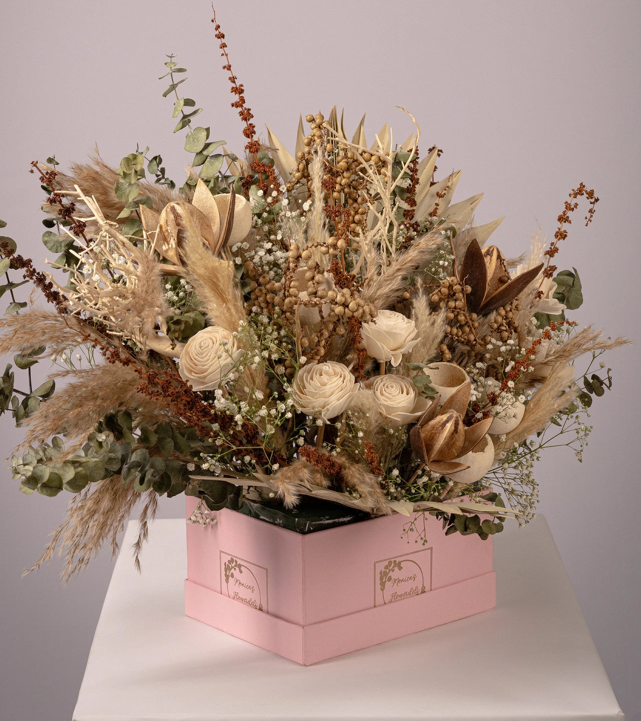 Dry flower arrangement by Monica's Flowerdeli